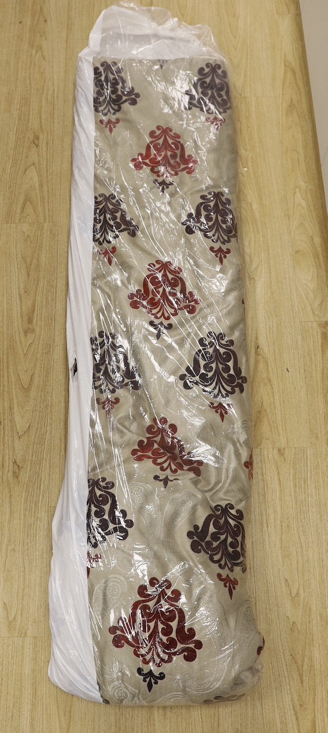 A large pair of silver brocaded curtains, with a woven paisley tear drop motif and large all over plum cut velvet Fleur-de-lis motifs, together with matching corded and tasselled tie backs.